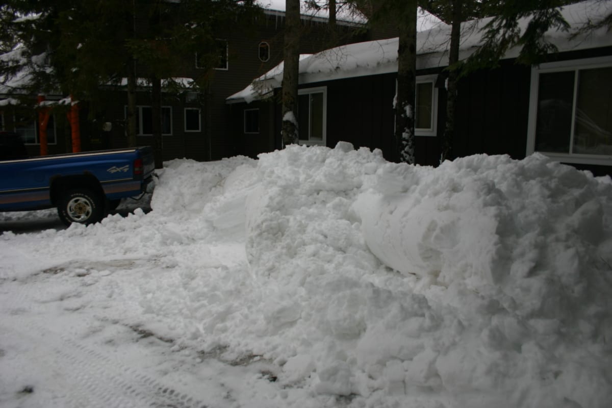 All of the snow piles John worked so diligently to remove with the bobcat last week have returned.