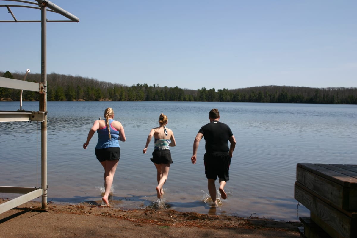 Randy, Kelly and Katie Friesema our first guests of the season also decided to be the first guest to swim in the lake. Water temps are around 40 degrees since the ice just went out this week.