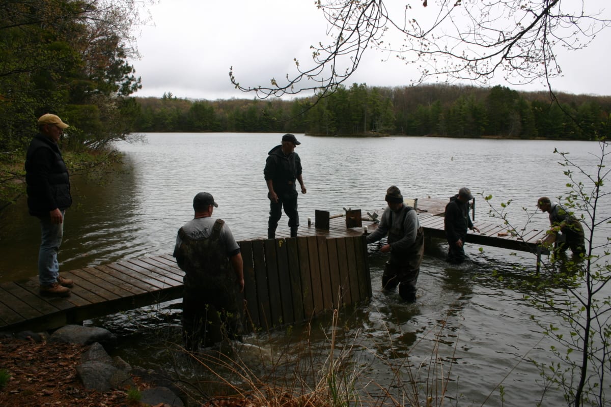 One of the 78 sections of dock being lifted into the water.