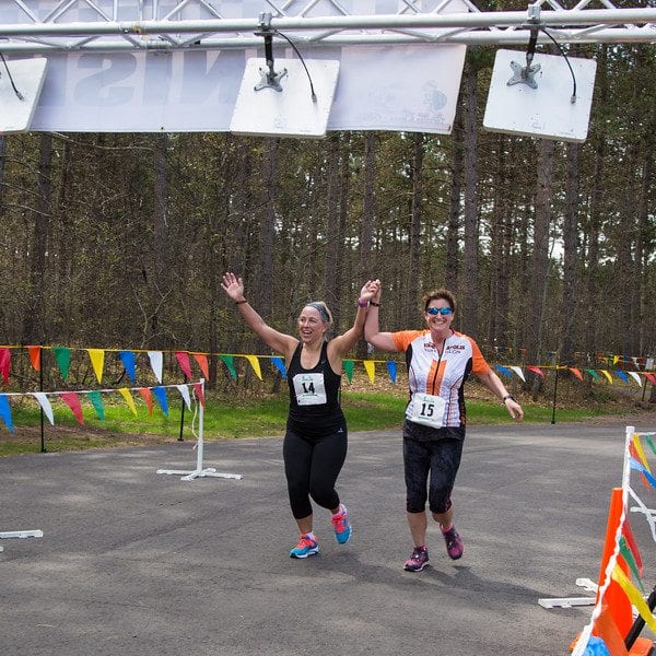 Deb and Jill crossing the finish line.
